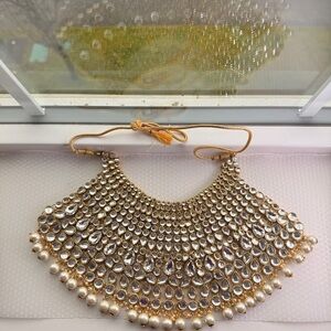 Elegant gold and pearl chokar necklace